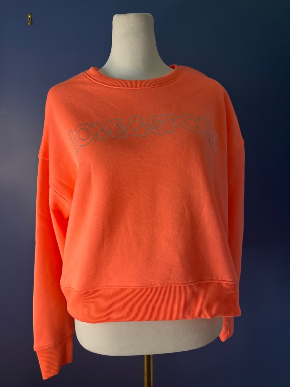 Love & Sports neon coral sweatshirt, w silver "love & sports" logo, sz 8-10 soft